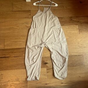 free people movement beige jumpsuit